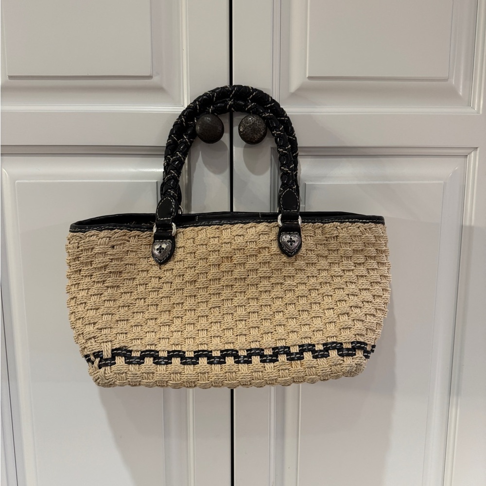 Brighton Tan and black woven straw tote bag with braided handles.